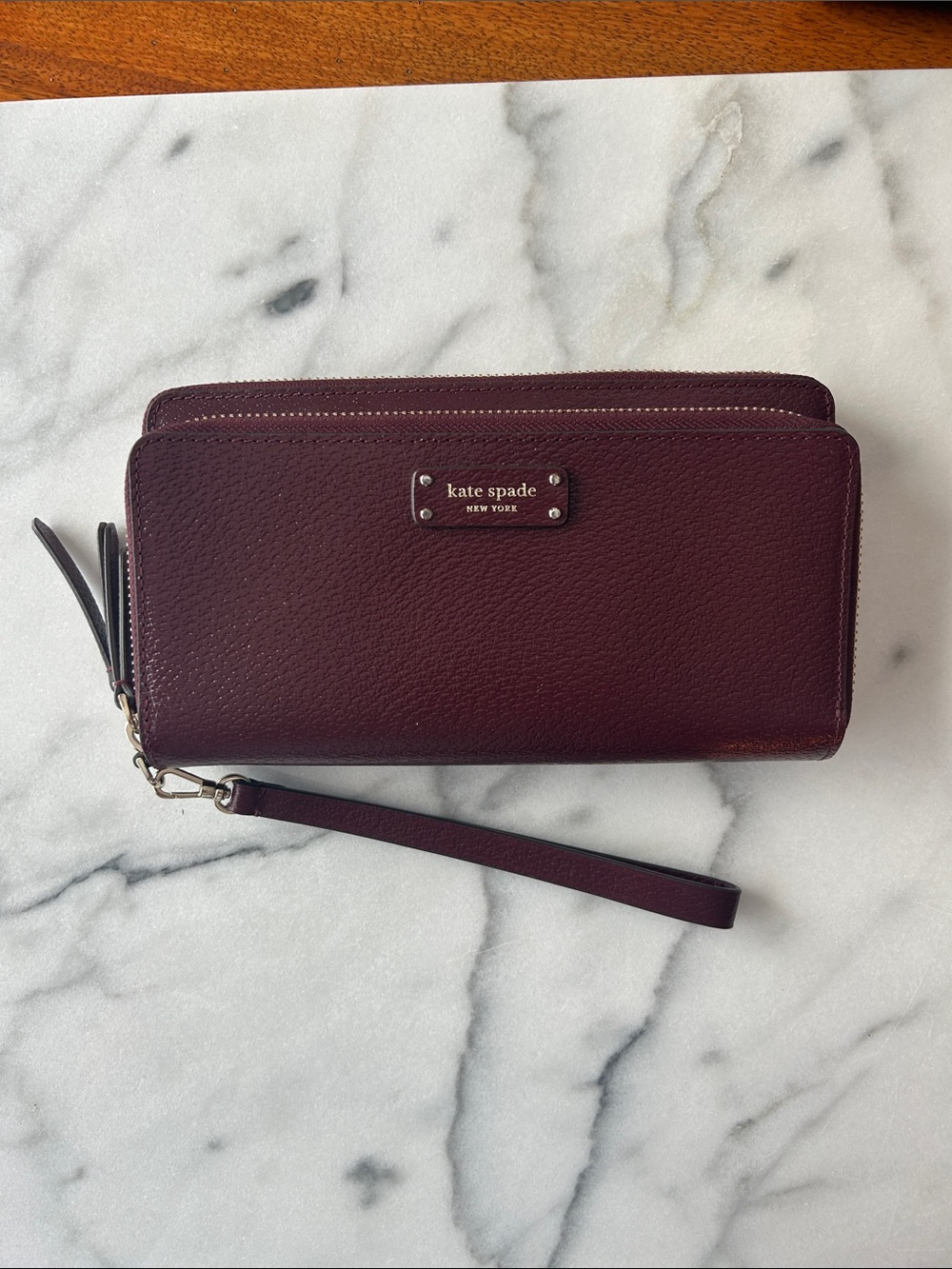 kate spade Deep Plum Pebbled Leather Zip Wristlet Wallet